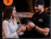 An AAS valet returns the keys to a guest.